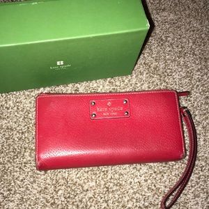 Kate Spade Red wallet holds iPhone 7 Plus!